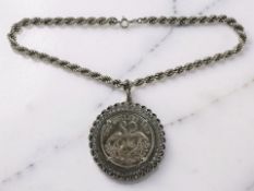 A 1969 Bahama Islands Silver Two Dollar Coin, mounted on silver rope-twist chain, gross weight 60.