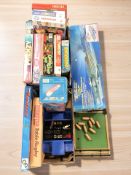 A collection of board games, Micromachines aircraft carrier in box, Matchbox die cast cars, etc.
