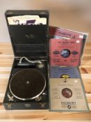 A vintage tabletop record player.
