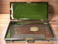 An antique Bavarian zither in case