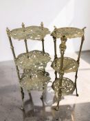 Two cast brass three tier pan stands.