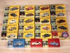 A collection of Lledo and Vanguards classic cars in boxes