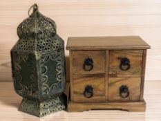 A miniature hardwood four drawer chest, width 30 cm, together with an eastern-style lantern.