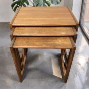 A G-Plan teak nest of three tables, width 54 cm.