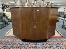 A 20th century Turnidge walnut veneered bow front cocktail bar counter,
