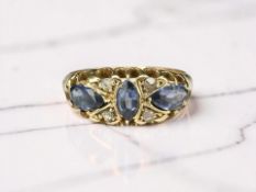 An antique 18ct gold synthetic sapphire and diamond ring, size P CONDITION REPORT: 3.