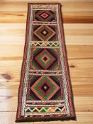 A Suzni Kilim runner,