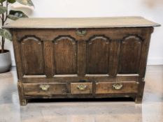 A George III panelled oak mule chest, 149 cm x 53 cm x 90 cm.