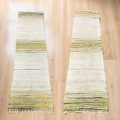 A pair of modern Krimlind runners, each 62 cm x 226 cm.