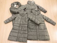Four Next Petite padded coats, with retail tags, various sizes.