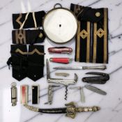 A silver George V and Queen Mary folding knife, together with further pocket knives, police whistle,