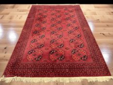 A machine-made Turkoman-design carpet,