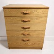 A 20th century teak veneered five drawer chest, 76 cm x 44 cm x 98 cm.