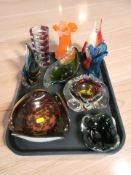 A group of art glass bowls, baskets and vases, one vases in the form of a swordfish.