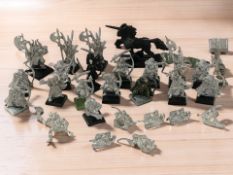 A group of Games Workshop die cast Warhammer figurines, tallest 5 cm.