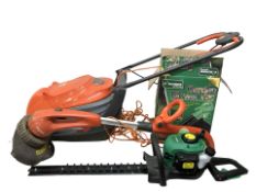 A Flymo electric lawnmower, a strimmer,