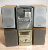 A Panasonic CD stereo system SA-PM28, with speakers, and a Sony micro hi-fi CMT-CPX1 with speakers.