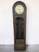 An early 20th century oak long case clock with gilt dial signed 'Dufa', with pendulum and weights,