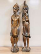 A pair of South-East Asian carved hardwood statues, height 64 cm.