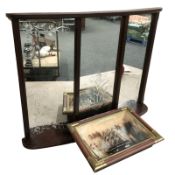A mirrored bow front fire screen and a ship montage in frame.