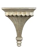 A reproduction silvered wall bracket, height 52 cm.