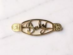 A 9ct gold Baby brooch, width 3cm CONDITION REPORT: 1.