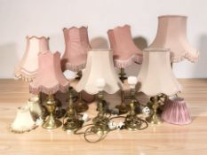Ten various brass table lamps.
