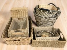 A group of wicker baskets, largest 56 cm wide.