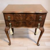A 20th century mahogany serpentine front two drawer chest, width 62 cm.