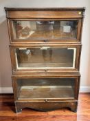 A late Victorian Rockwell-Wabash expansion bookcase, 88 cm x 36 cm x 140 cm.