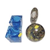 A large globular glass paperweight with internal rainbow colours, height 10 cm,