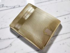 A George V Art Deco 9ct gold cigarette case, Charles S Green & Co Ltd, Birmingham 1931,