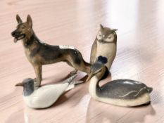 A Royal Copenhagen figure of a German Shepherd No. 3261, length 18 cm, together with an owl No.