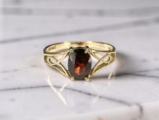 A 9ct gold garnet ring, size L CONDITION REPORT: 1.