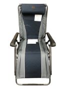 A Timber Ridge folding garden lounger.
