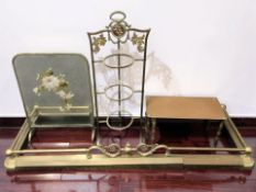 A Victorian brass plant stand, a painted mirrored fire screen, a footman and a fire curb.