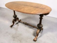 A Victorian figured walnut oval occasional table, length 118 cm.