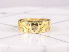 An 18ct gold diamond-set ring with hinged cover revealing the word 'Dearest',
