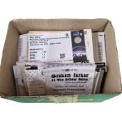 A collection of music concert ticket stubs including The Who, Robert Plant, Bruce Springsteen,