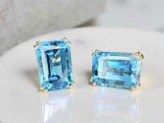 A pair of 9ct yellow gold blue topaz earrings, 16.2ct. CONDITION REPORT: 6.