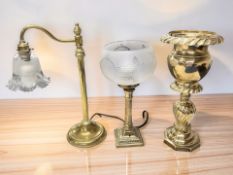 An Edwardian brass desk lamp with moulded glass shade,