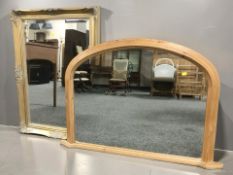 A gilt and bevelled over mantel mirror, 88 cm x 64 cm, together with a pine mirror.
