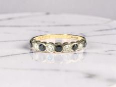 A 9ct gold sapphire and CZ dress ring, size O CONDITION REPORT: 1.