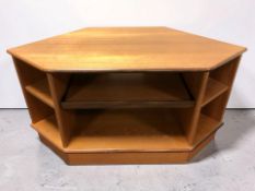 A contemporary teak television stand, width 100 cm.