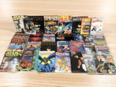 A group of annuals including Thundercats, Oor Wullie, Batman, Star Wars magazines, Batman comics,