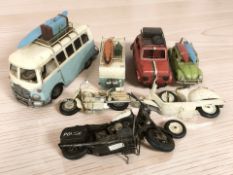 A group of tin plate vehicle models, camper van, etc, largest 40 cm long.