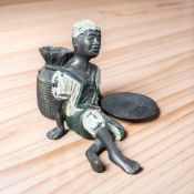 A cold painted metal figure of a North African man in the style of Bergmann, height 11.5 cm.