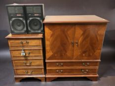 A yew wood entertainment cabinet and a further pedestal cabinet containing JVC hi-fi components.