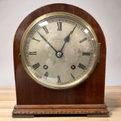 A mahogany mantel clock signed 'Bravington', striking on a gong, height 22 cm.
