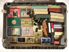 A collection of playing cards, dominoes, etc.
